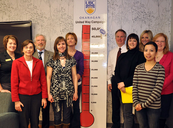 Deputy Vice Chancellor and Principal Doug Owram (third from left) congratulated the UBC United Way committee on Friday on the success of this year's campaign. Committee members are (from left): Layne McDougall, Gwen Zilm, Lindsay Peruniak, Deanna Simmons, Don Thompson, Alanna Vernon, Sarah Henderson and Lois Marshall.
