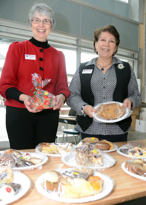 United Way committee members Louise Nelson and Sharon McCoubrey present some of the tasty items that helped make this year's event the most successful yet.