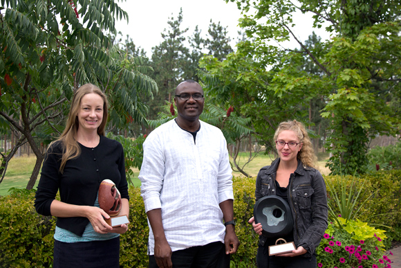 Dean Wisdom Tettey (centre) presents the new FCCS awards for Teaching Excellence and Teaching Innovation to winners Karis Shearer (left) and Allison Hargreaves (right).