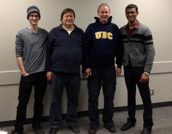From left: student Mathew Levasseur, Tournament Director Greg Bishop, tournament winner Graham Swett, and student Omkrishna Shah.