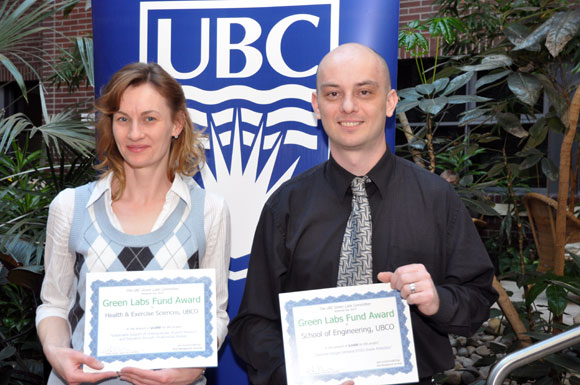 Zoё Soon (left) and Tim Abbott accept certificates for their Green Research Fund proposals.