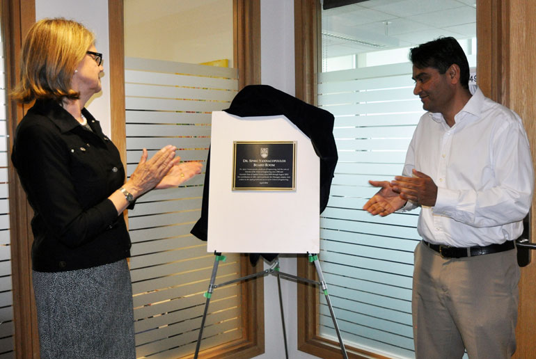 Deputy Vice-Chancellor Deborah Buszard and Associate Dean of Engineering Rehan Sadiq unveil the plaque for the Dr. Spiro Yannacopoulos Board Room.