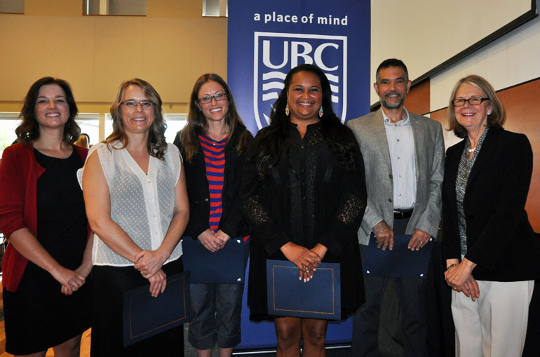 2016 Staff Awards of Excellence winners Alana Jordan, Cherie Michels, George Athans and Leah Sanford stand with (far left) Director of Student Development and Advising Michelle Lowton and (far right) Deputy Vice-Chancellor and Principal Deborah Buszard.