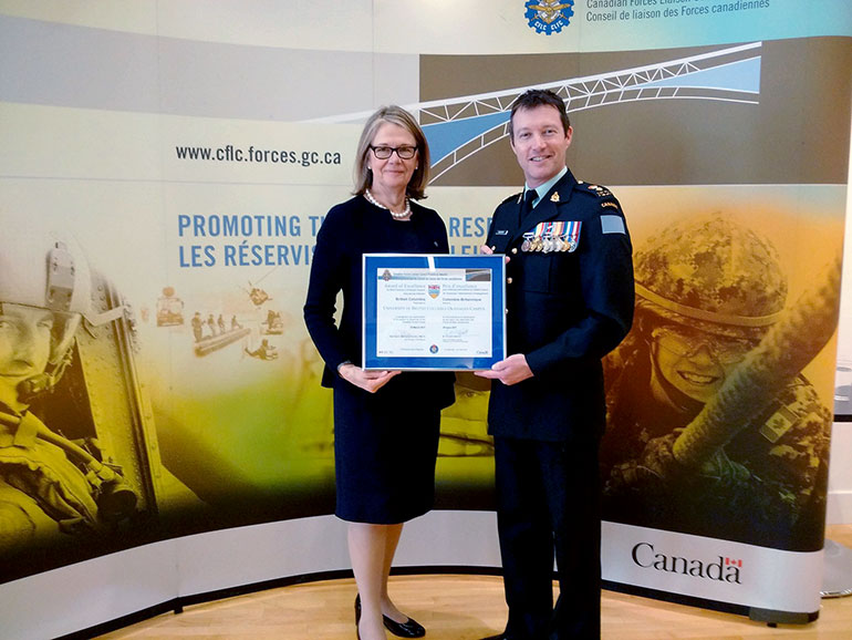 Deputy Vice-Chancellor and Principal Deborah Buszard accepted UBC Okanagan’s Canadian Forces Liaison Council Provincial Award of Excellence in recognition of UBC’s support of reservists, such as Lt. Col. Mike McGinty.
