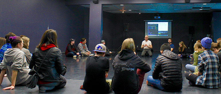 Experience UBC students were divided into groups and tasked with combining words with movements during the Creative and Critical Studies session