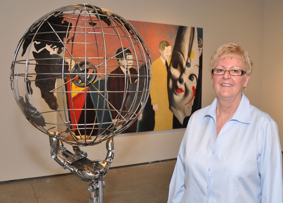 Curator Susan Belton views an untitled 2007 steel  sculpture symbolizing global citizenship by Vernon artist Cory Fuhr, part of the "Male Perspective" art exhibit at UBC's Fina gallery. 