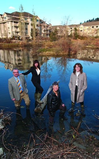 Ron Mattiussi, City Manager; Leanne Bilodeau, Director, Sustainability Operations; Kelowna Mayor Sharon Shepherd and Jackie Podger, Associate Vice President Administration and Finance, are pictured in Shift at Valley Glen Wetland promoting UBC’s collaborative partnership with the City to foster sustainable community development.