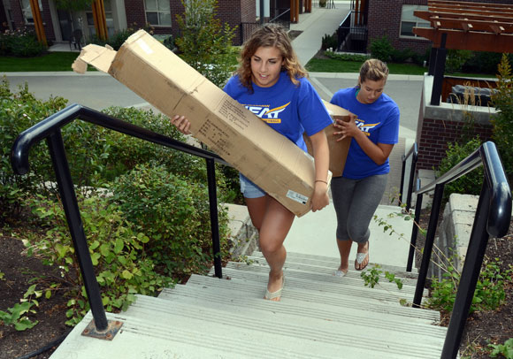 It’s a good thing they’re athletes because members of the University of British Columbia’s Okanagan campus Heat sports teams will get plenty of exercise this weekend when they help 1,700 students move into campus residences. This is not the first time fourth-year Human Kinetics students and volleyball players Alex Basso, front, and Kaylan Gouldsborough will help with the big move. Both the men’s and women’s volleyball and basketball teams volunteer their time.