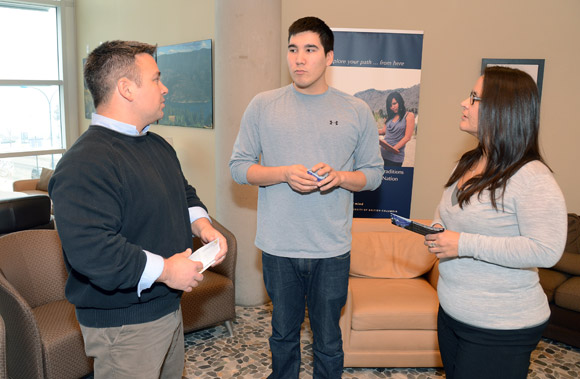 Aboriginal student Cody Kenny, in third-year Human Kinetics, middle, chats with Arthur Stevens, Bridging Program co-ordinator, Dalhousie University, left, and Kara Paul, Manager of the Aboriginal Health Sciences Initiative at Dalhousie University during their visit to the Okanagan campus.