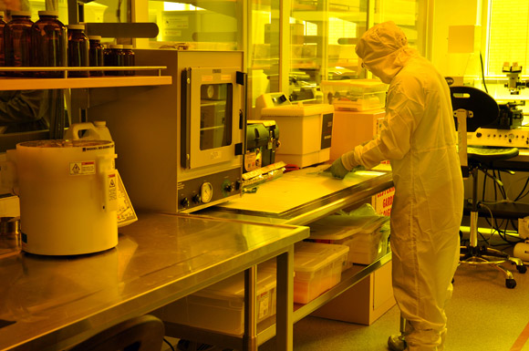 An engineering student works in the class 100 clean room in the new Micro Electro Mechanical (MEMS) Fabrication facilities at UBC's Okanagan campus.