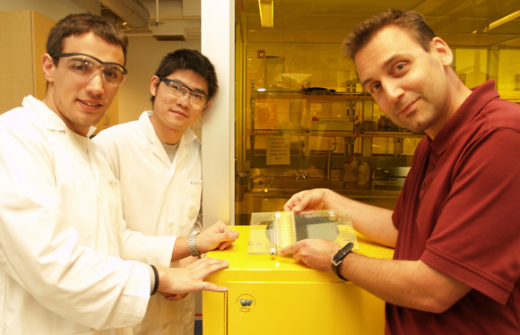 Jonathan Holzman (right) with students Daniel Guerrero and Xian Jin.