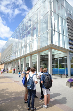 Students outside the J. Peter Meekison Student Centre at UBC’s Okanagan campus