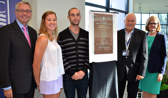 Unveiling the dedication plaque for the official opening of the $4.1-million Hangar fitness centre on UBC’s Okanagan campus Tuesday are UBC President Stephen Toope, Heat women’s volleyball co-captain Chandler Proch, Heat men’s basketball co-captain Yassine Ghomari, Kelowna Flightcraft founder Barry Lapointe, and Deputy Vice-Chancellor and Principal Deborah Buszard. The Lapointe family donated $3.5 million to build the new fitness centre.