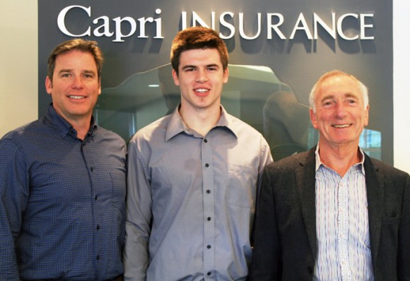 Capri Insurance’s Tim Miller and Robin Durrant congratulate student athlete Buster Truss (centre) on being the sixth recipient of the annual Capri Insurance Athletics Entrance Scholarship.