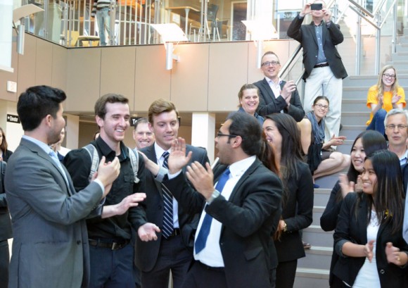 Management students Davis Yates, David Kuhn, Douglas Canning, Regina Gonzalez Garcia, and Aneeq Siddiqui celebrate after hearing their team won the Argus Cup and the $5,000 grand prize. 