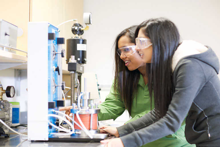 Engineering students Sneha Philip and Saveena Kahlon, right, conduct lab work at UBC’s Okanagan campus. The School of Engineering hosts its inaugural open house on November 19. 