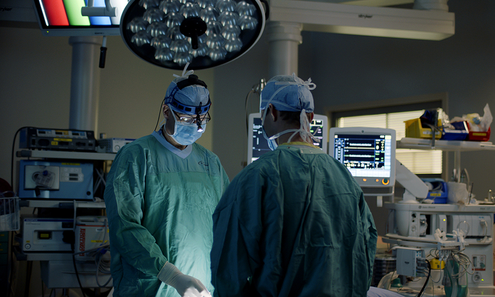 Two doctors in a surgical suite