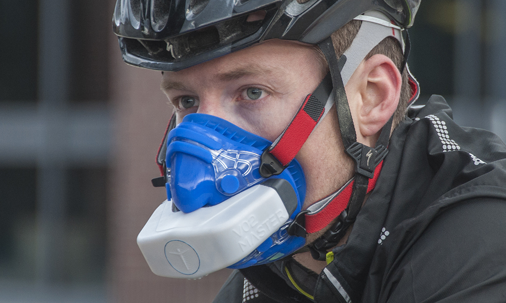 cyclist wearing oxygen mask
