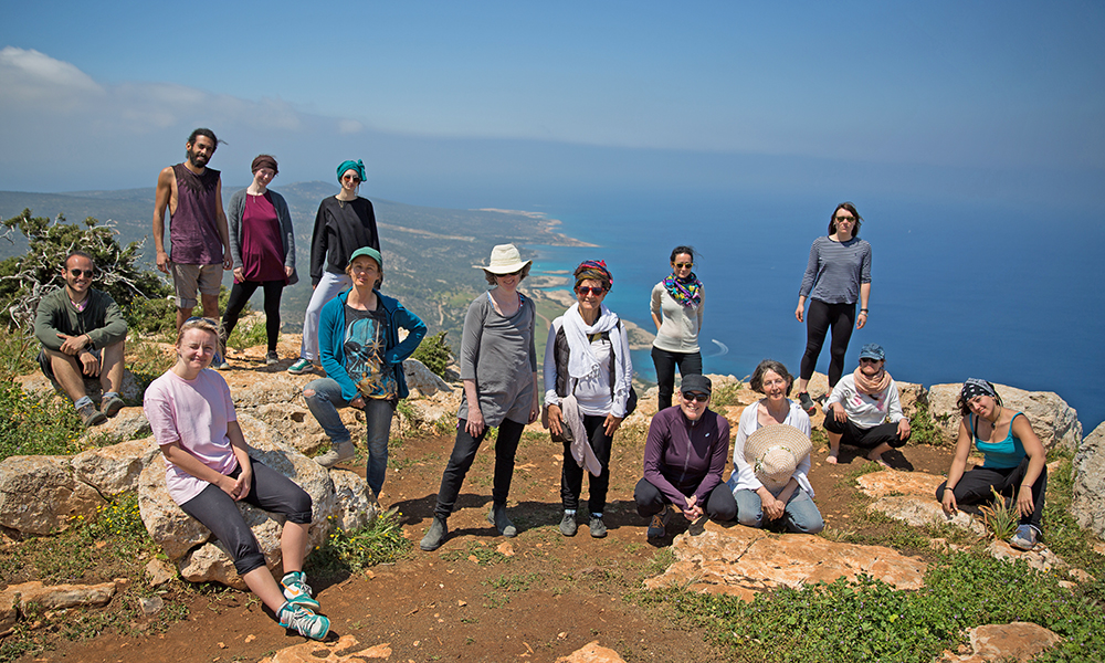 BC Okanagan professors and others standing on a cliff in Cyprus 