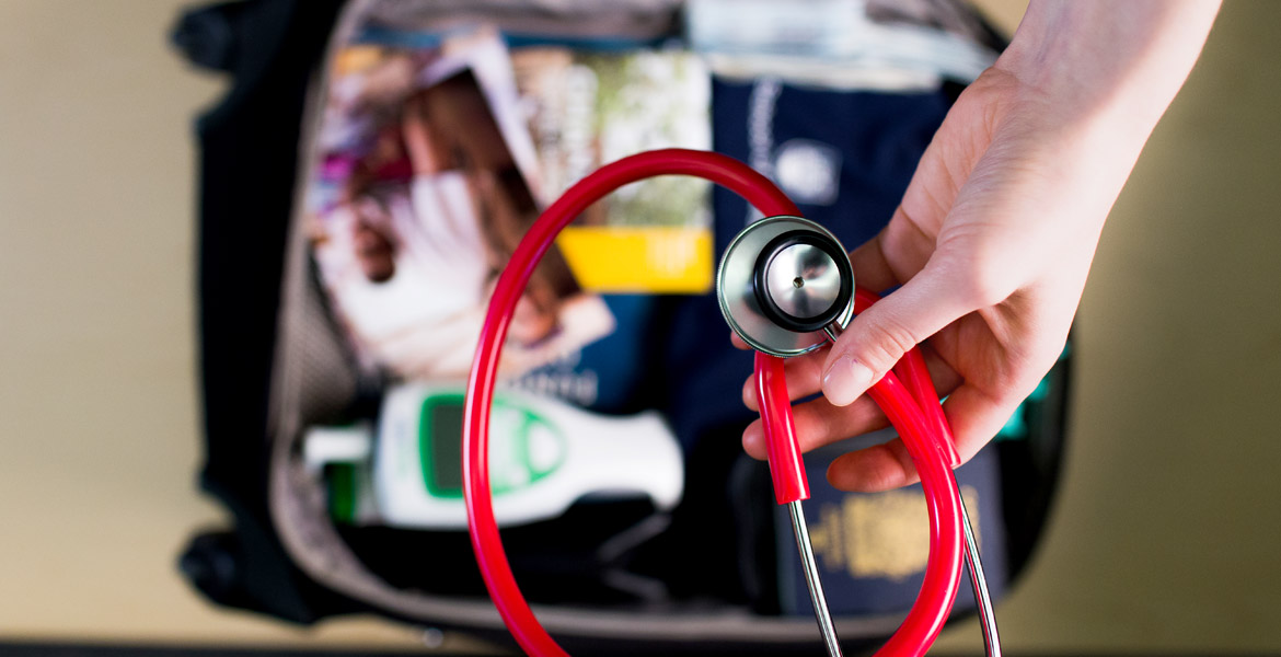 Nurse packing a red stethoscope