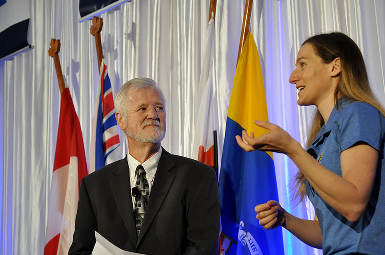Host Pat Kennedy listens while Dr. Meghan Grant explains the up and down journey she endured on her way to becoming a gold medal cyclist for Canada. 