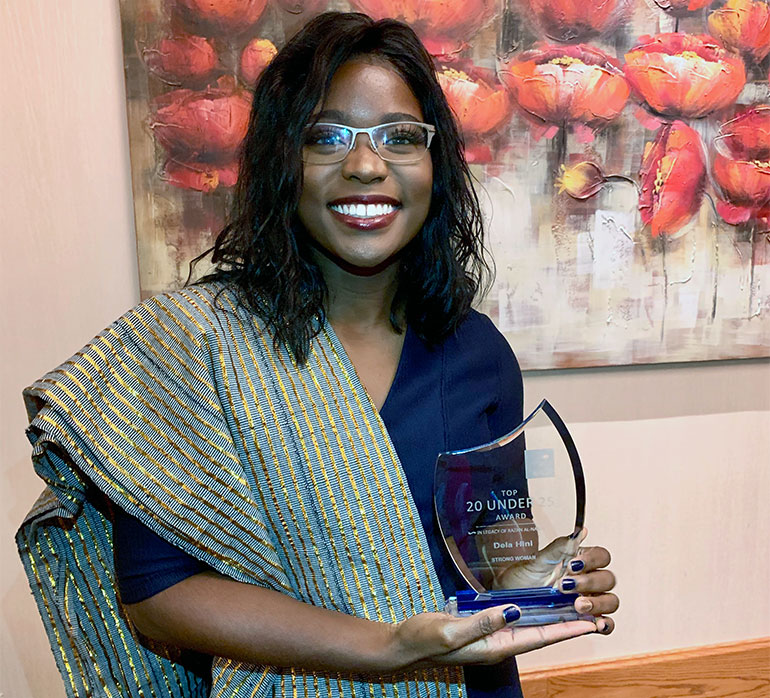 Dela Hini won a Strong Woman award for creating her pink backpack project which distributed sanitary supplies, toiletries and cosmetics to exploited and marginalized women in Kelowna.