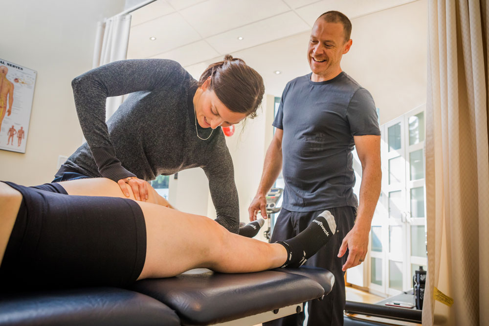  Serwa works on a patient's leg during her physio practicum.