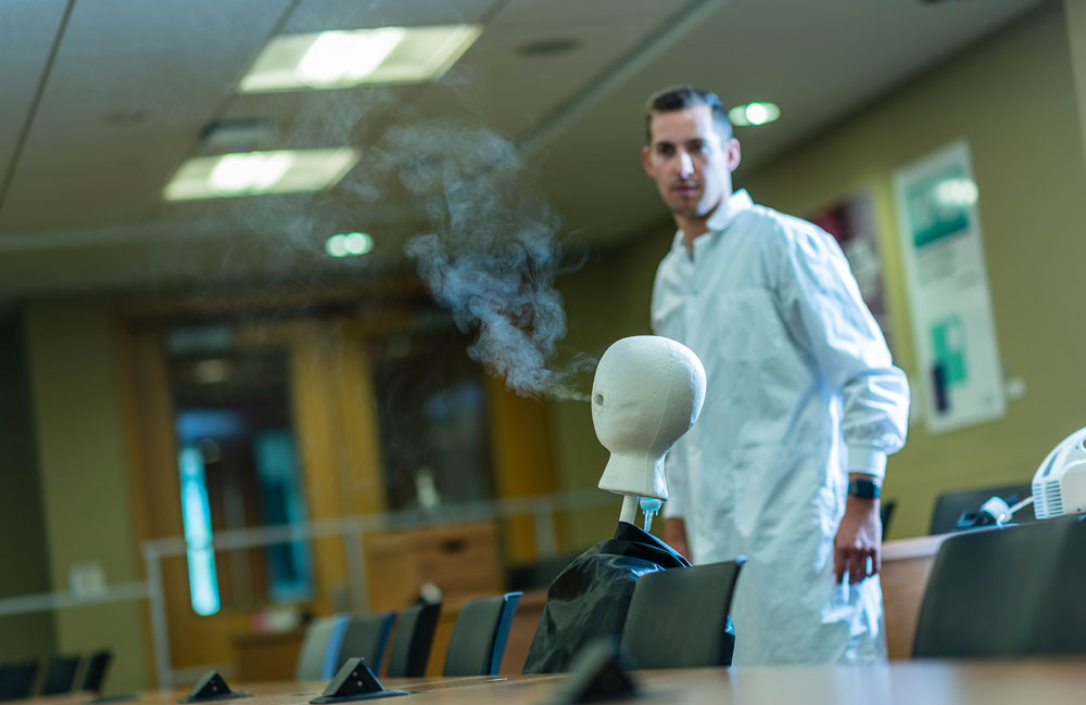 A foam head emitting vapour to simulate a person breathing