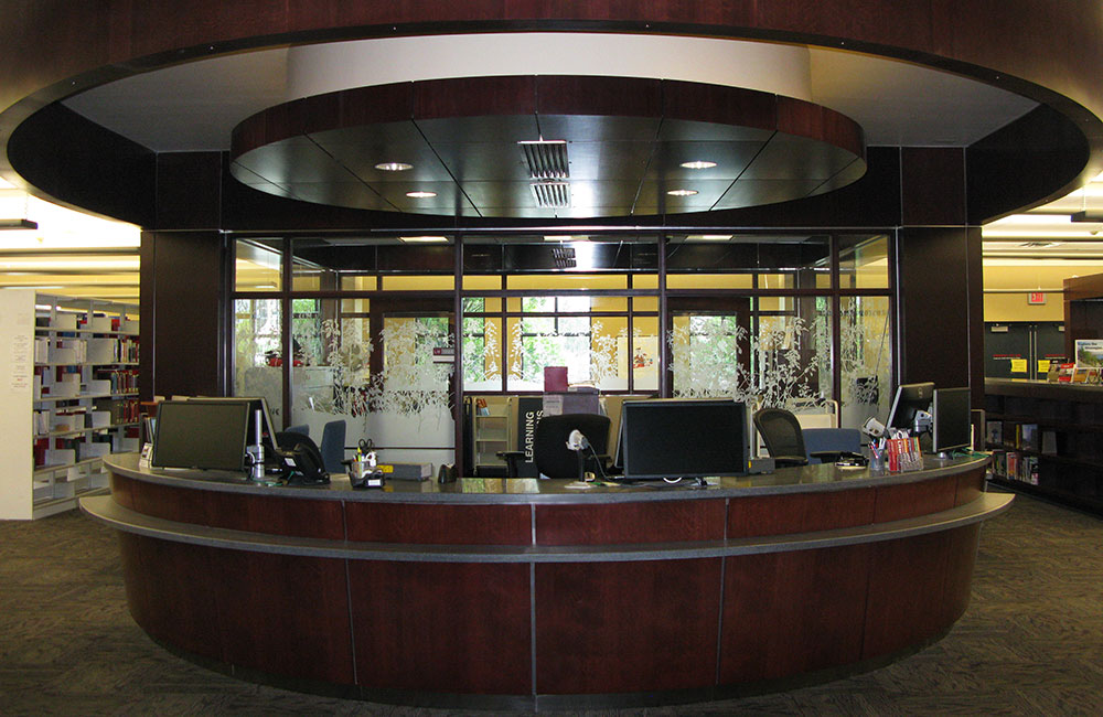 The dark and imposing library help desk