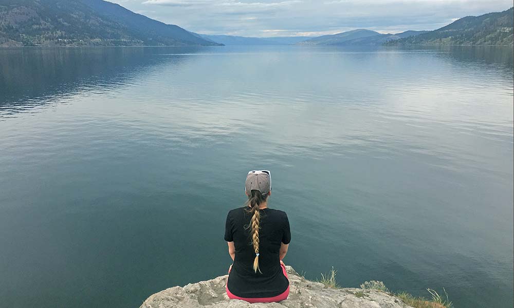 Sarah Dow-Fleisner overlooking a lake
