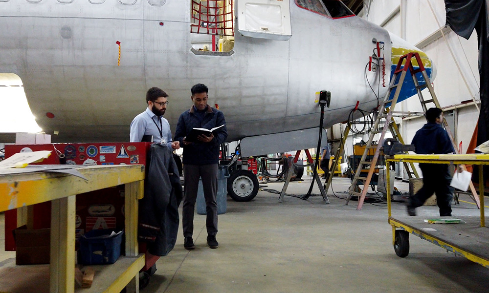 Two UBC alumni working on an aerospace project. 