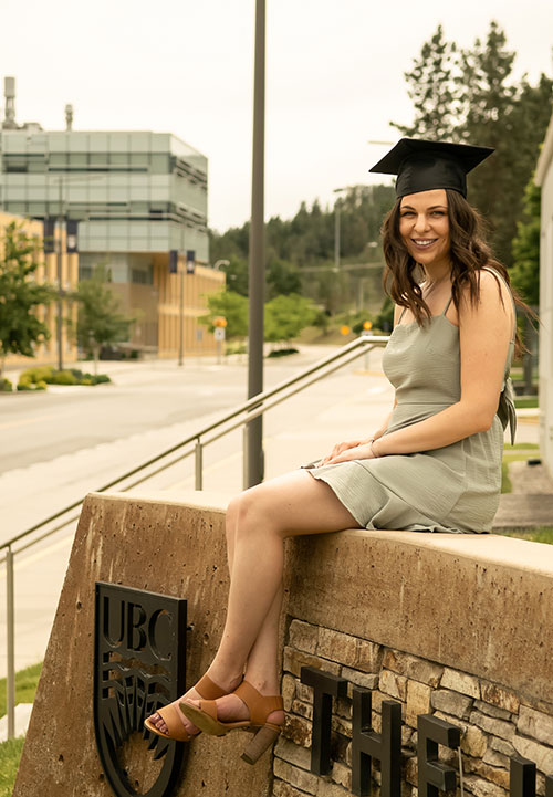 Sierra Kasper-Momer wearing a graduation cap