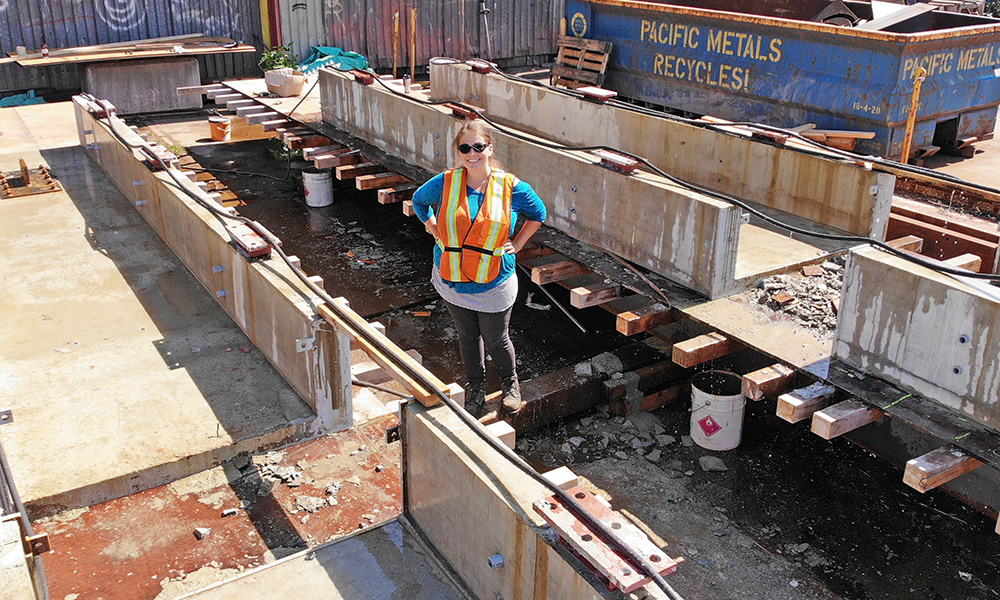 Lisa Tobber stands at a construction site 