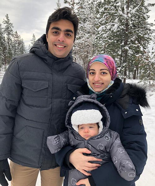 Mahmoud Hasabelnaby pictured with his wife and son outside