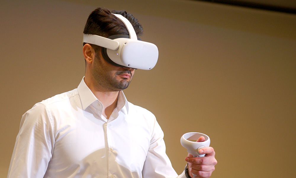 Peyman Yousefi using a VR headset.