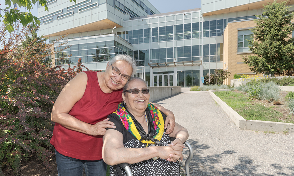 A photo of Kathleen Michel and Rose Caldwell outside UBC Okanagan’s Engineering Management and Education Building