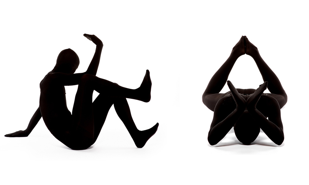 A Rorschach-type photo in which Michael V Smith is in a black body suit against a white backdrop. He is making shapes with his body that are meant to be interpreted. Two such images are shown here 