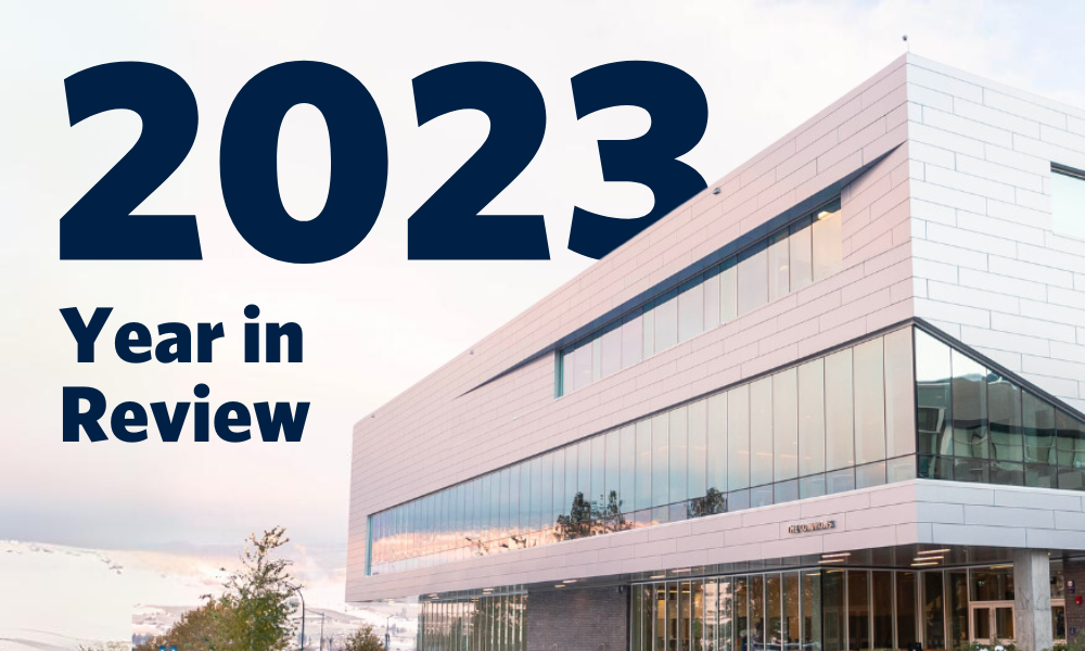 The UBC Okanagan Commons building with "2023 year in review" written in the sky.