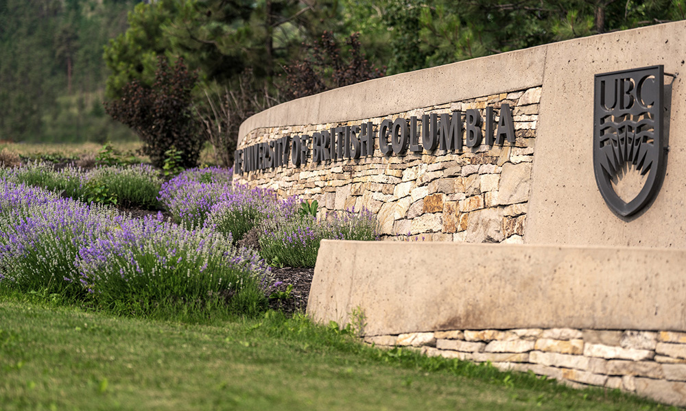 A photo of the decorative stone entrance to the UBCO campus.